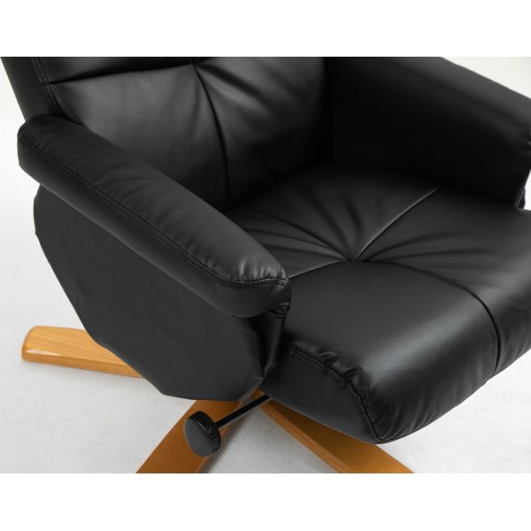 Duva Liegesessel mit Fuhocker aus schwarzem PU mit braunen Beinen