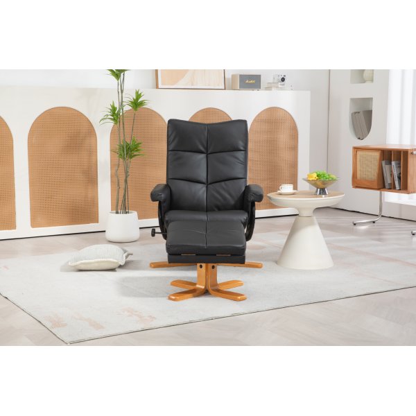 Duva Liegesessel mit Fuhocker aus schwarzem PU mit braunen Beinen