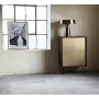 Volumenschrank in Walnuss / Messing