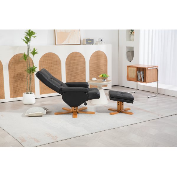 Duva Liegesessel mit Fuhocker aus schwarzem PU mit braunen Beinen