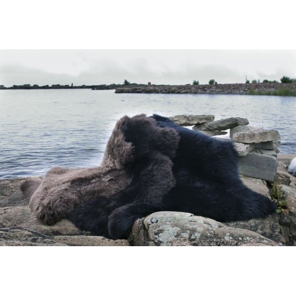 Sanft langhaariges Schaffell Schwarz Sanft langhaariges Schaffell Schwarz