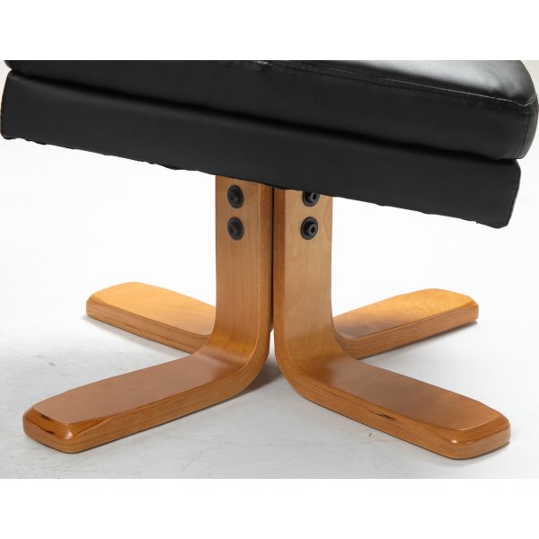 Duva Liegesessel mit Fuhocker aus schwarzem PU mit braunen Beinen