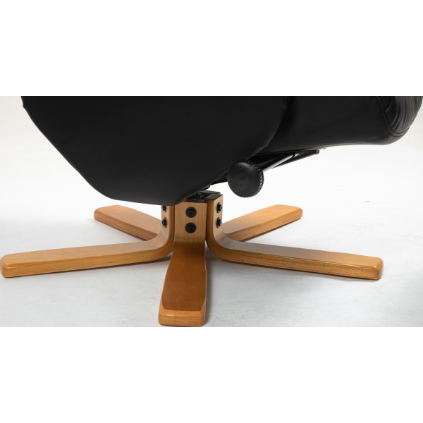 Duva Liegesessel mit Fuhocker aus schwarzem PU mit braunen Beinen